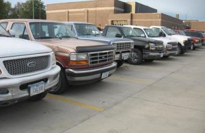 The original group of students that lined up their trucks, front forward, during the 2011-2012 school year