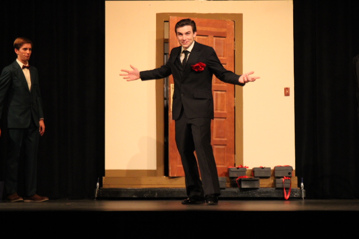Mr. Boddy (Ryan Sales) enters the mansion...but with style
