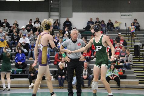 Damien Clark shaking hands with his Norwalk opponent  after he pinned him at the Bill Van horn tournament.