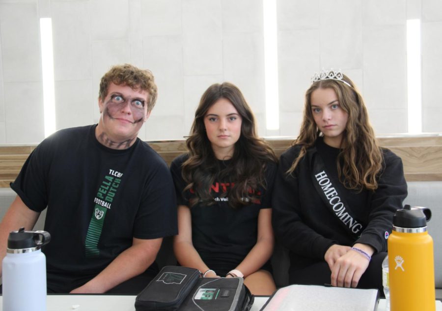 Seniors Gage Gift, Anneka Stotfus, and Jasmine Namminga dress in black for wars. Color wars was the 4th dress up for homecoming. “Homecoming was such a good week,” said  Namminga. “I loved participating in dress up days.”
