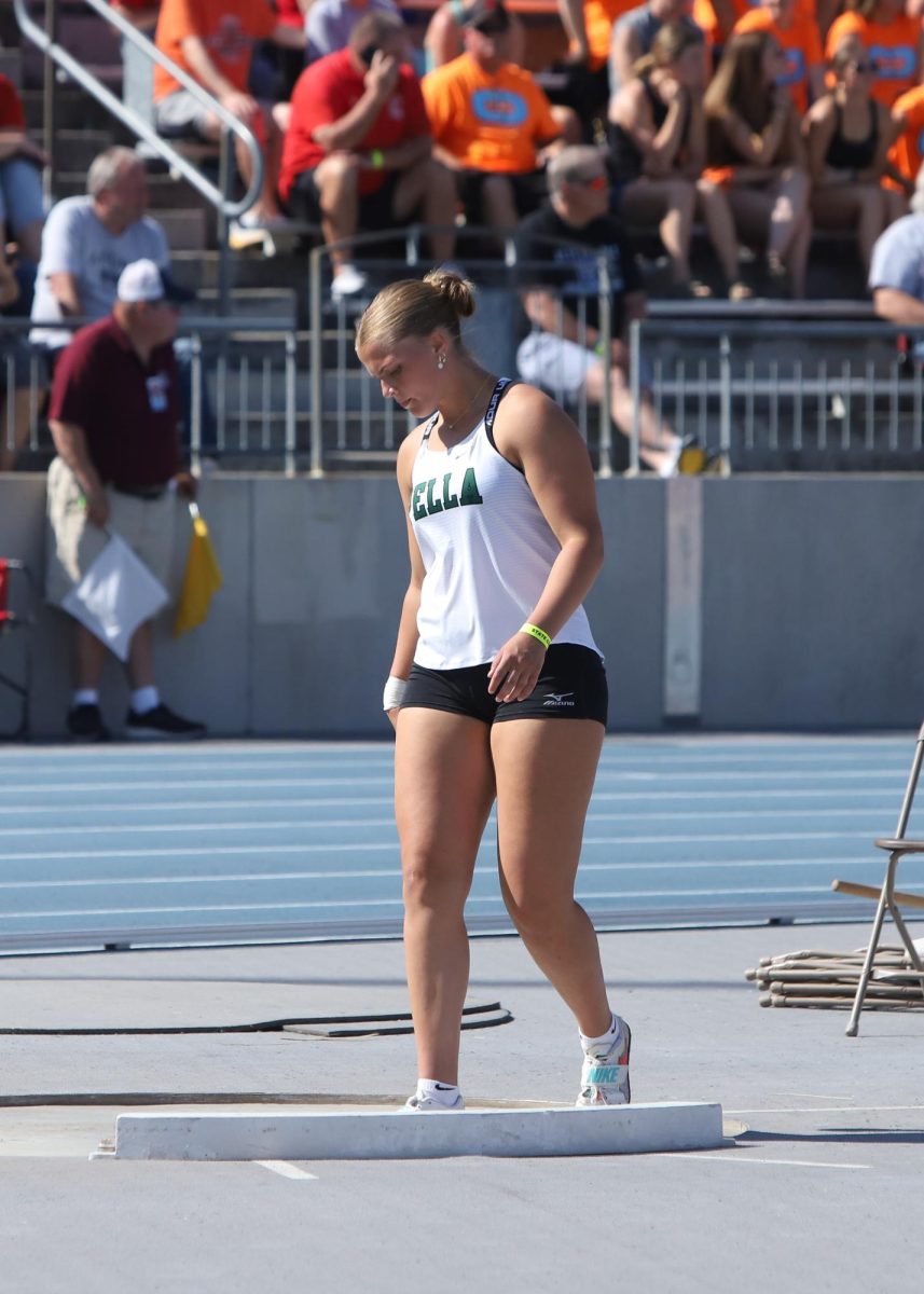 Katie Scheckel getting ready to throw shot put at State Track