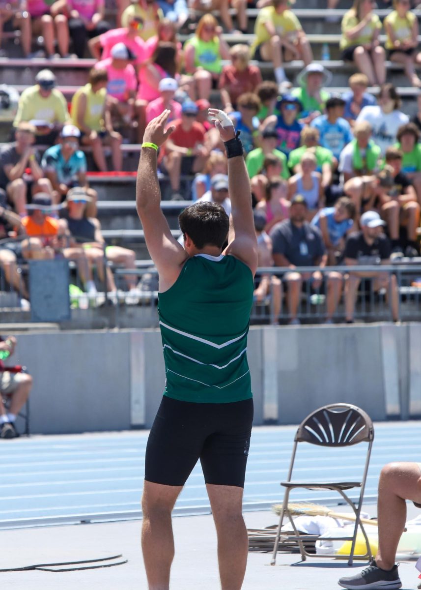 Hanson King pumping up the crowd before his final throw. 