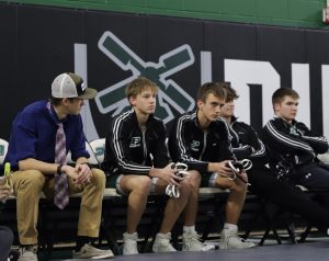 Kanten Lyle (right of blue shirt) at a home wrestling meet