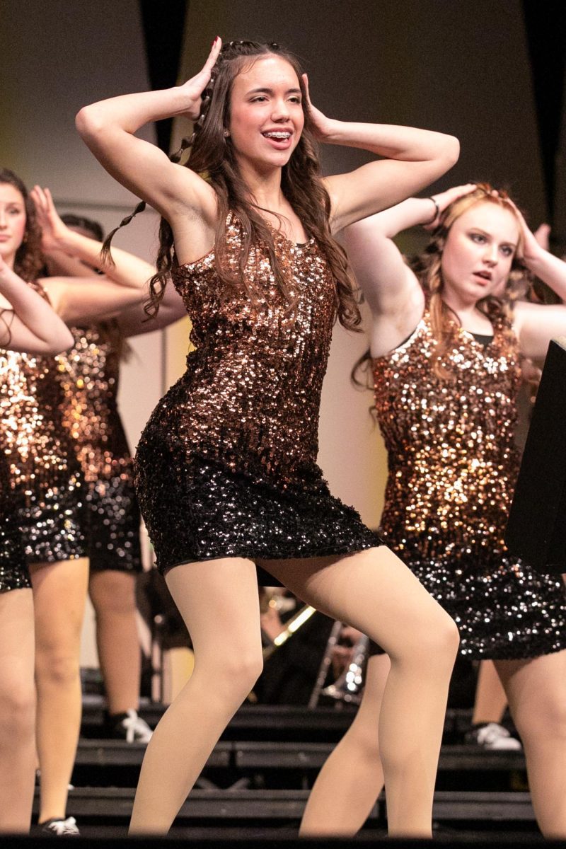 Freshman Ellie Smock performs in the Parent Preview showcase. She is a part of Bravo's 2025 show themed around caffeine. "It has been fun to become a part of such a successful Show Choir program," said Smock. "I look forward to future years of doing Show Choir."